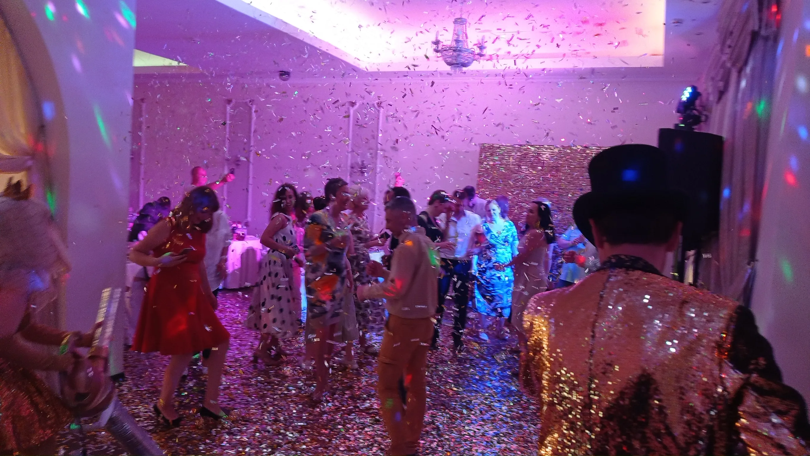 Confetti drop on a packed dance floor
